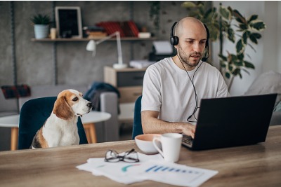 Man working from home with his dog
